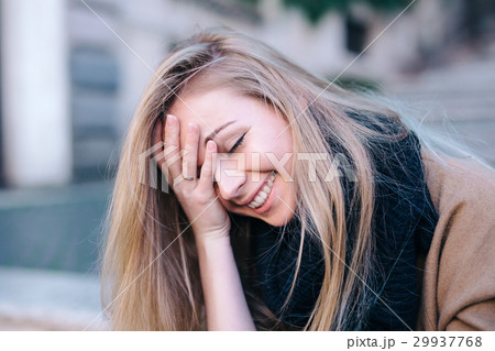 Blonde young woman smiling laughing fashion 29937768