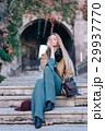 Blonde woman outdoors city walk fashion lifestyle 29937770