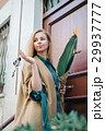 Real estate young woman city building door 29937777