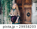 Young woman real estate city building door 29938203