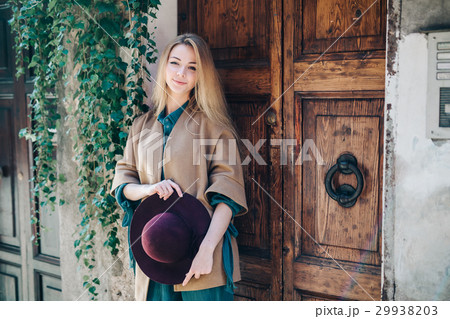 Young woman real estate city building door 29938203