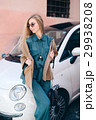 Rental car customer fyoung woman blonde hair 29938208