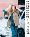 Rental car customer fyoung woman blonde hair 29938211