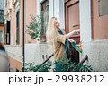 real estate young woman city building door 29938212