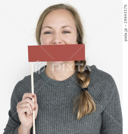 Caucasian Woman Holding Flag Covering Mouth 29943570