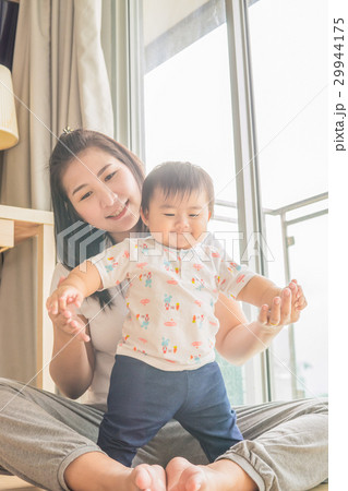 Happy mother holding adorable child baby boy.. 29944175