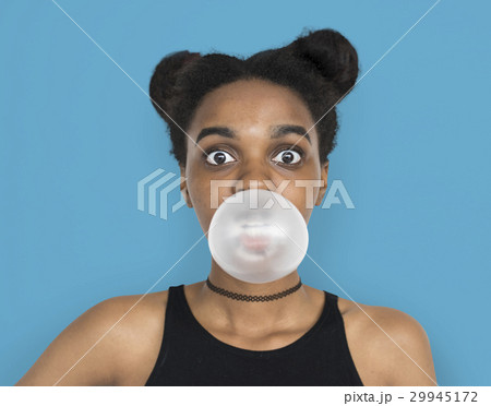 African Woman Blowing Bubble Gum Playful Portrait 29945172