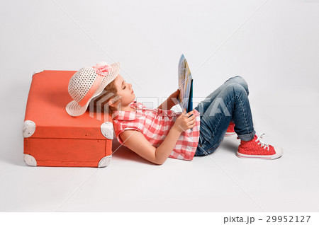 Child blonde girl with pink vintage suitcase and 29952127