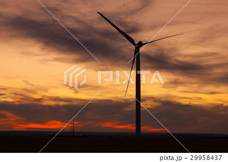 Windfarm at sunset and sky with dust from volcano 29958437