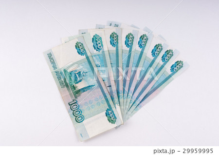 A stack of thousand-ruble banknotes, spread out  29959995