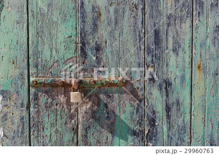 Rusty hinge of a wooden door Rusty hinge of a wooden door 29960763