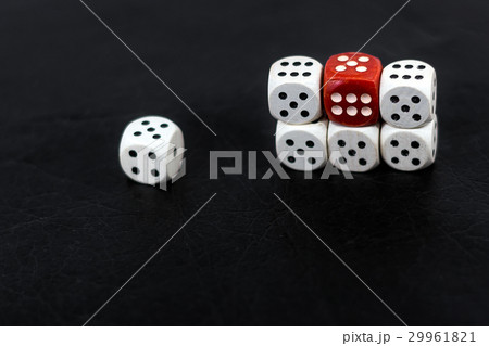 Dice six units and a red six on a black background 29961821