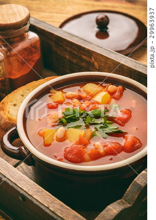 Hot bean soup with bacon and vegetables. 29963937