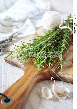 Organic bunch of fresh rosemary and garlic Organic bunch of fresh rosemary and garlic 29968228