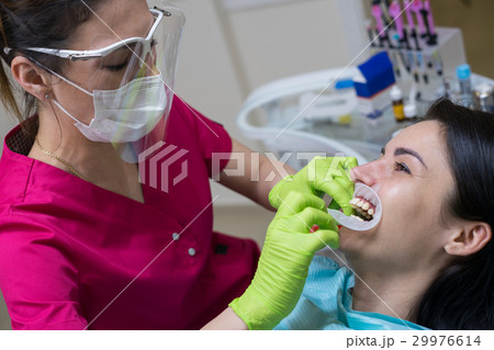 female patient at dentist in the clinic 29976614