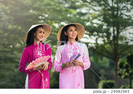 Portrait of Vietnamese girl traditional dress Portrait of Vietnamese girl traditional dress 29982965