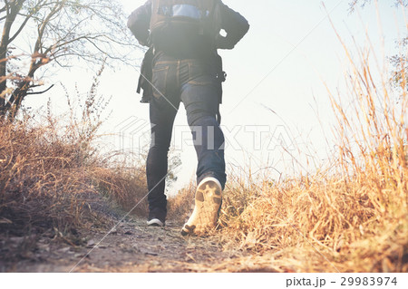 Young Man Traveler with backpack relaxing outdoor. 29983974