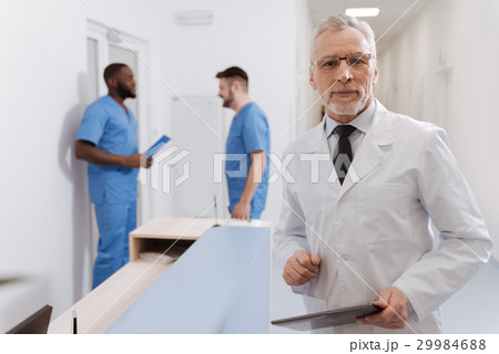 Elderly professor enjoying responsibilities at 29984688