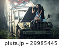 Asian model posing with old truck in an outdoor  29985445