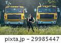 Asian model posing with truck in an outdoor  29985447