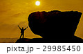 man celebrating his success top a mountain at suns 29985450
