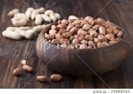 Peanuts in a wooden bowl 29988594