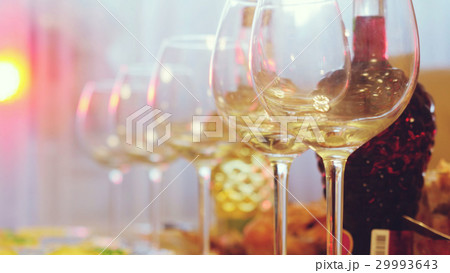 Glass glasses on a table in a restaurant, banquet 29993643