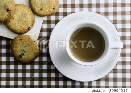 Coffee and Cookies on table. 29994517