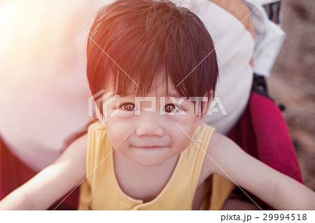 BabyBoy Smiling On Stroller in sunset. BabyBoy Smiling On Stroller in sunset. 29994518