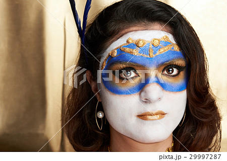 headshot of woman with mask 29997287