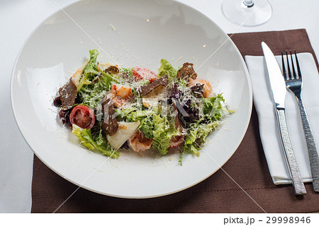Caesar salad with seafood 29998946