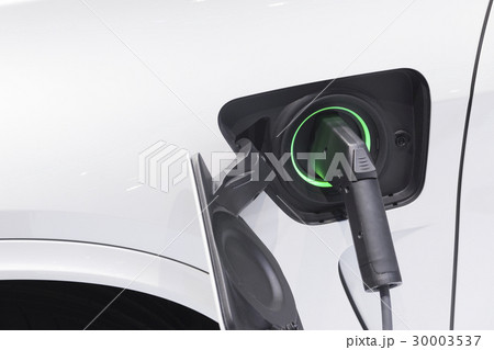 The electric car charger plugged 30003537