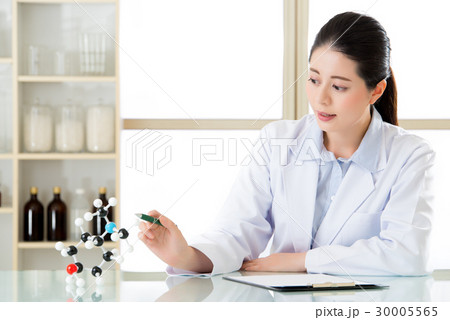 asian female chemist teacher point at molecular 30005565