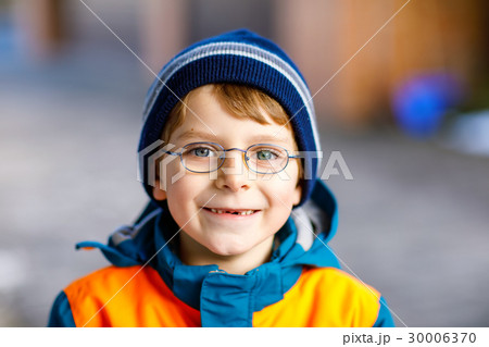 Portrait of little cute school kid boy with Portrait of little cute school kid boy with 30006370