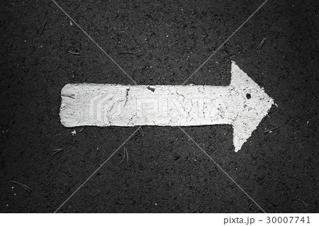White arrow over black highway asphalt White arrow over black highway asphalt 30007741