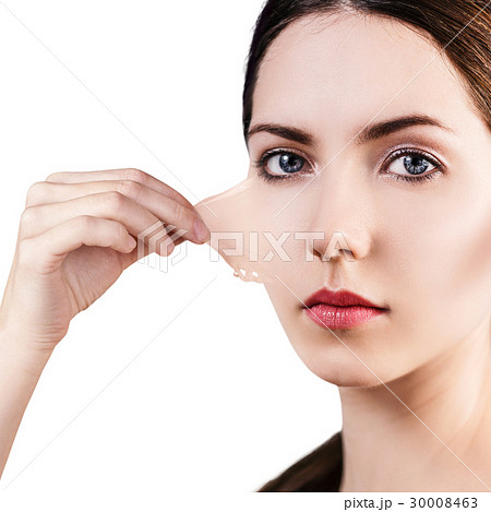 Woman remove her old dry skin from face. 30008463