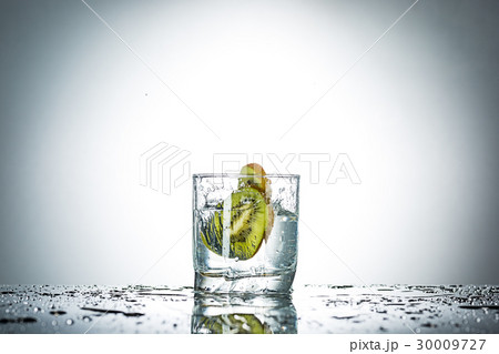water splash in glass of gray color water splash in glass of gray color 30009727