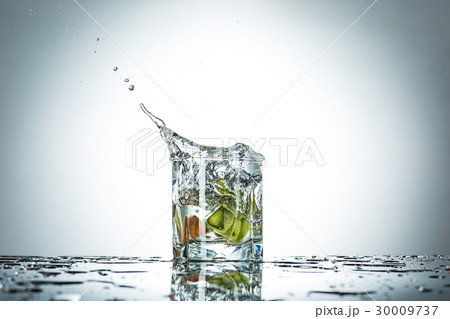 water splash in glass of gray color water splash in glass of gray color 30009737