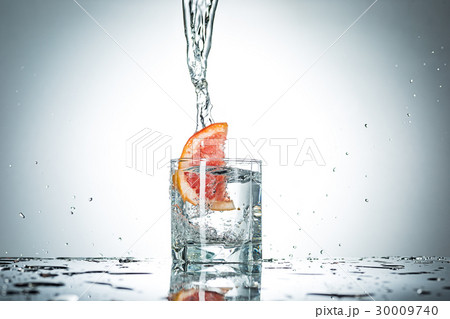 water splash in glass of gray color water splash in glass of gray color 30009740