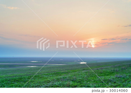 Sunrise on spring meadow Sunrise on spring meadow 30014060