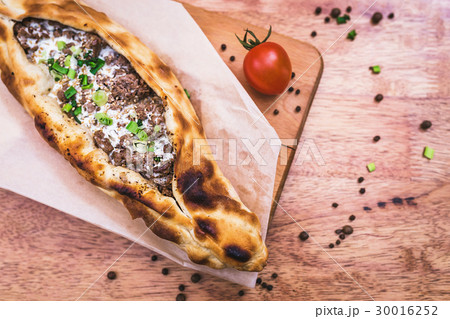 Turkish pizza with ground beef 30016252