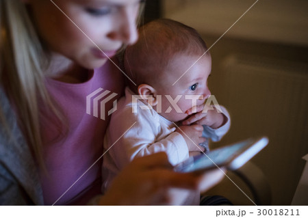 Beautiful mother with son in the arms, holding Beautiful mother with son in the arms, holding 30018211