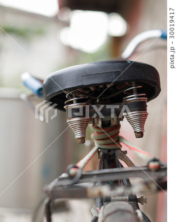 OLD BICYCLE SEAT SHOT FROM BACK OLD BICYCLE SEAT SHOT FROM BACK 30019417