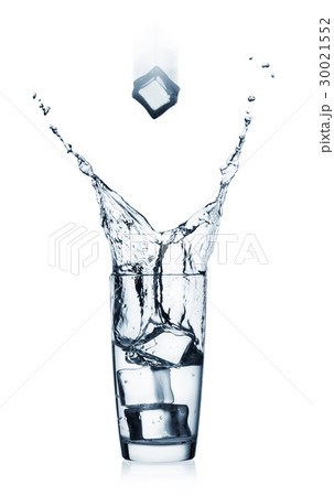 Splash in glass with clear water and flying ice 30021552