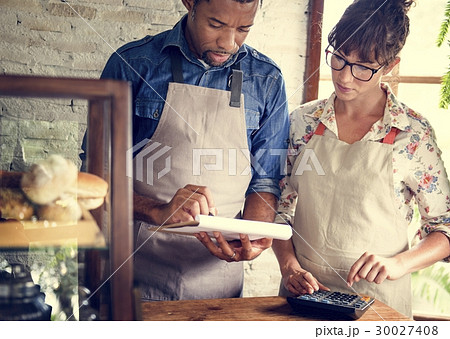 Men Checking Stock of Pastry in Bakery Shop Men Checking Stock of Pastry in Bakery Shop 30027408