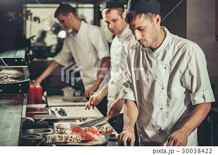 Preparing sushi set in restaurant kitchen 30038422