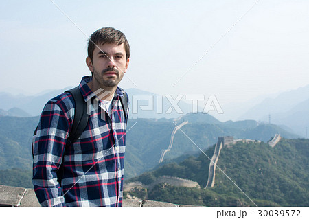 Tired man at the Great wall of China Tired man at the Great wall of China 30039572