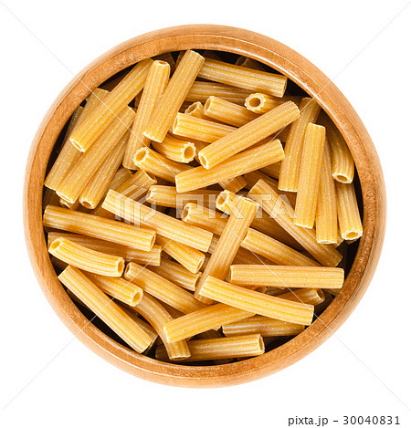 Chickpeas sedanini pasta in wooden bowl over white 30040831