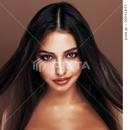 cute happy young indian woman in studio close up cute happy young indian woman in studio close up 30041847