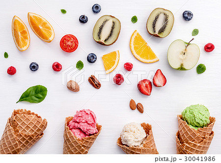 Cones and colorful various fruits. Cones and colorful various fruits. 30041986